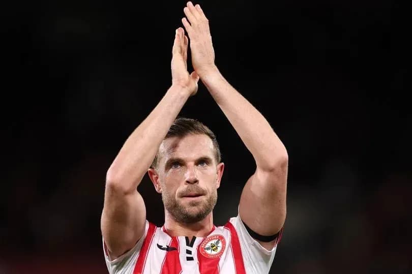 Player applauding fans after the match