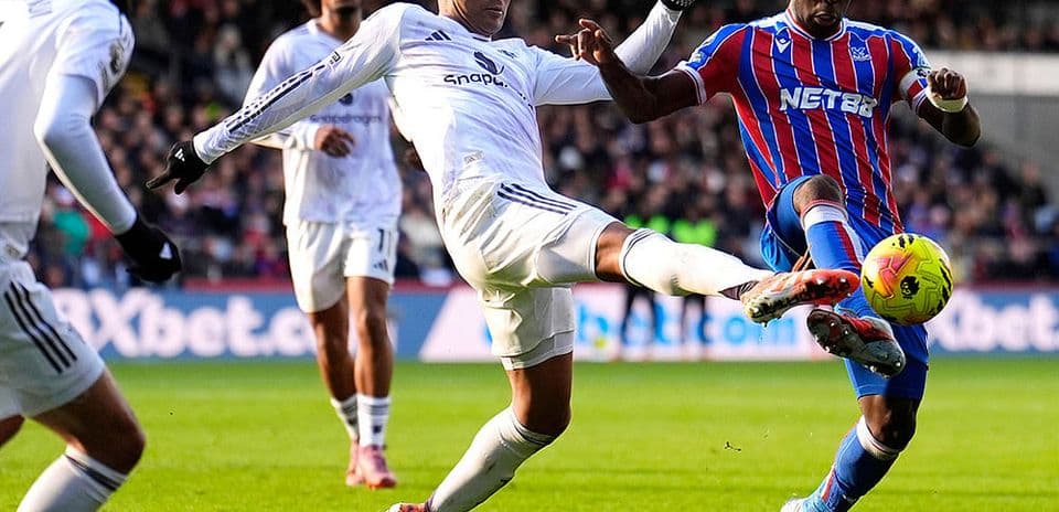 Players competing for the ball during match