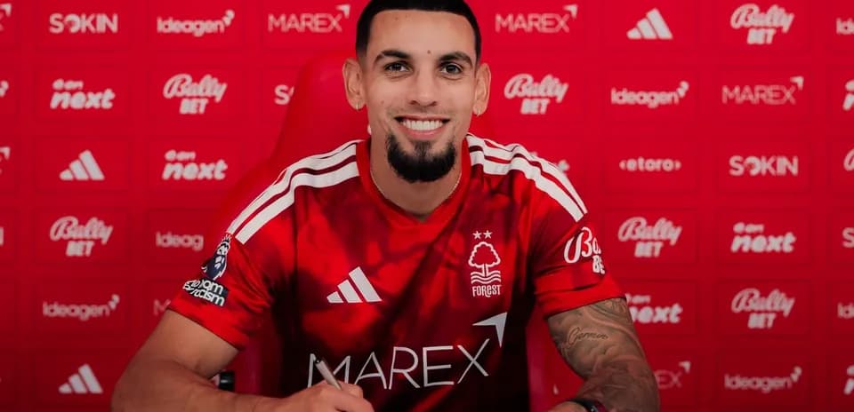 Player signing contract at Nottingham Forest press event
