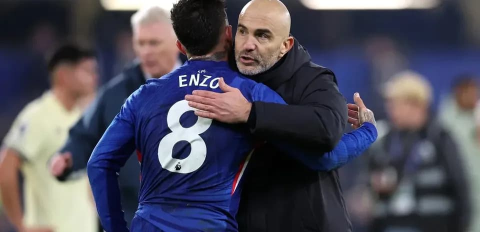 Player embracing coach after the match