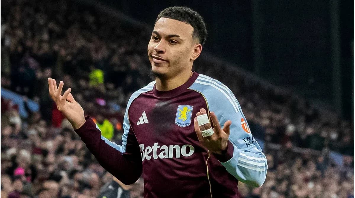 Aston Villa player gesturing during a match