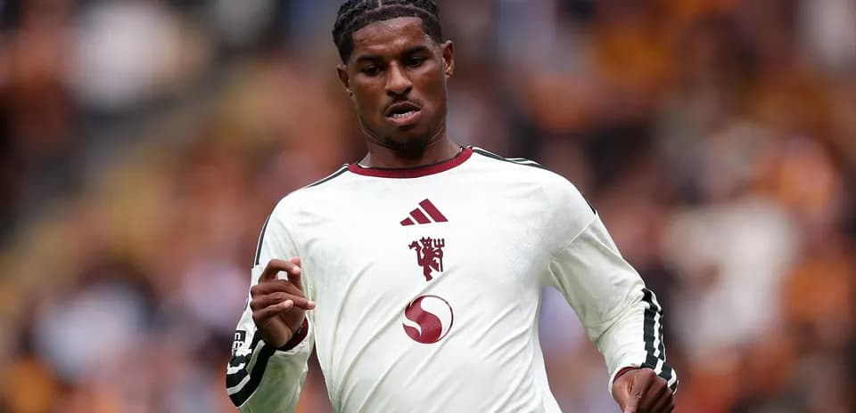 Player running during a football match on field