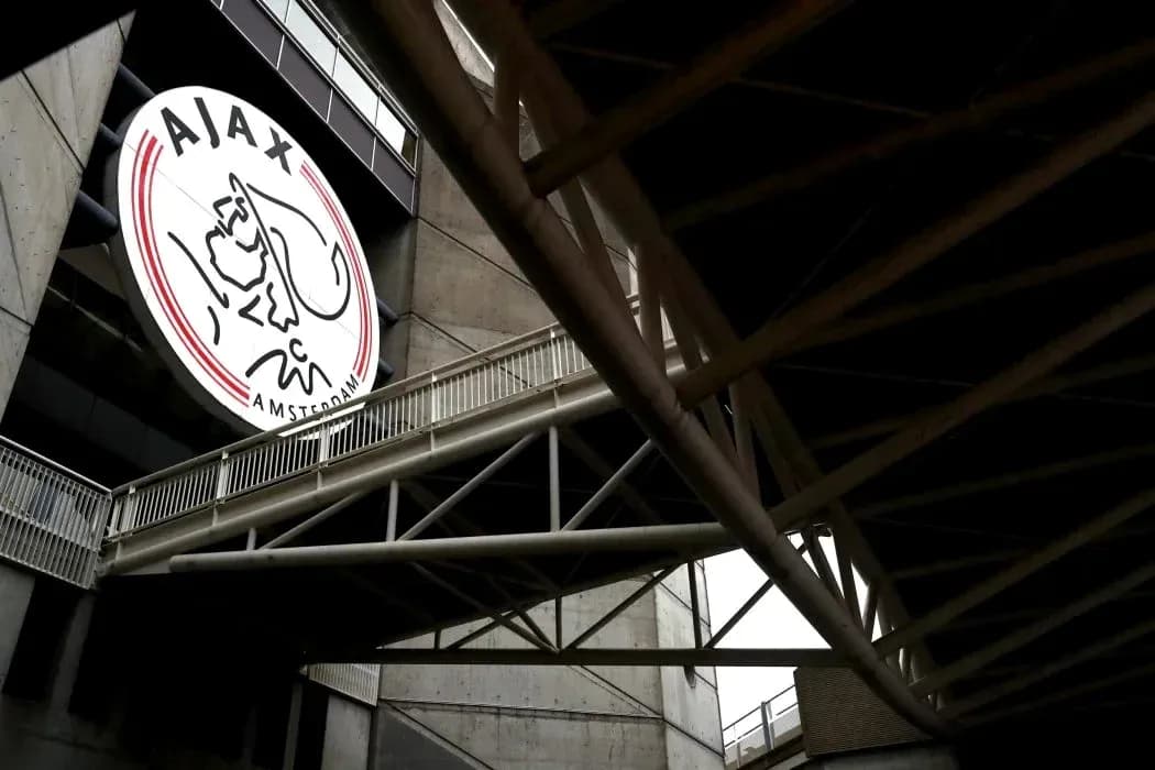 Ajax Amsterdam logo displayed on stadium exterior