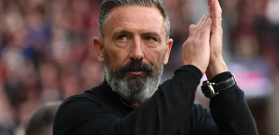 Coach applauding during a match