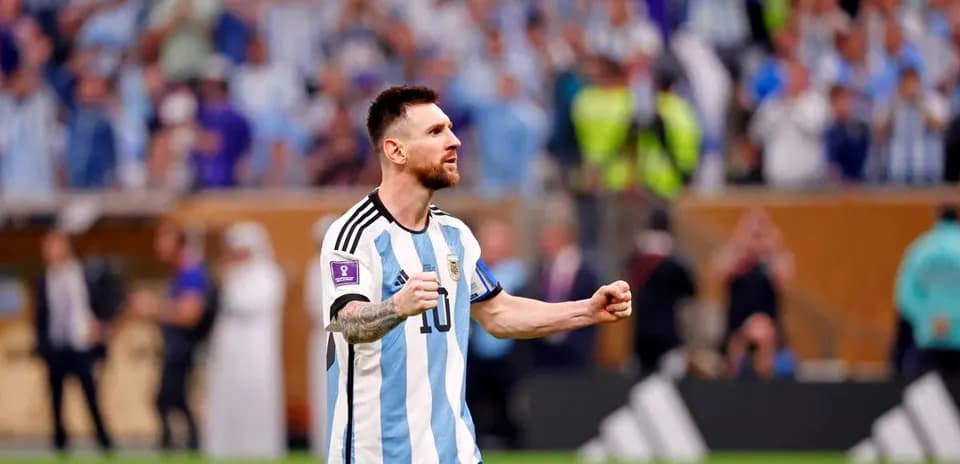 Lionel Messi celebrating in Argentina kit at stadium