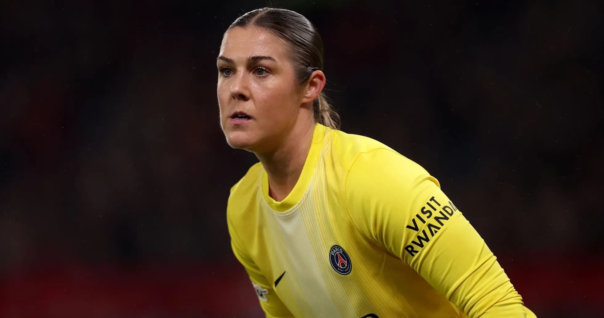 Goalkeeper in yellow uniform during match