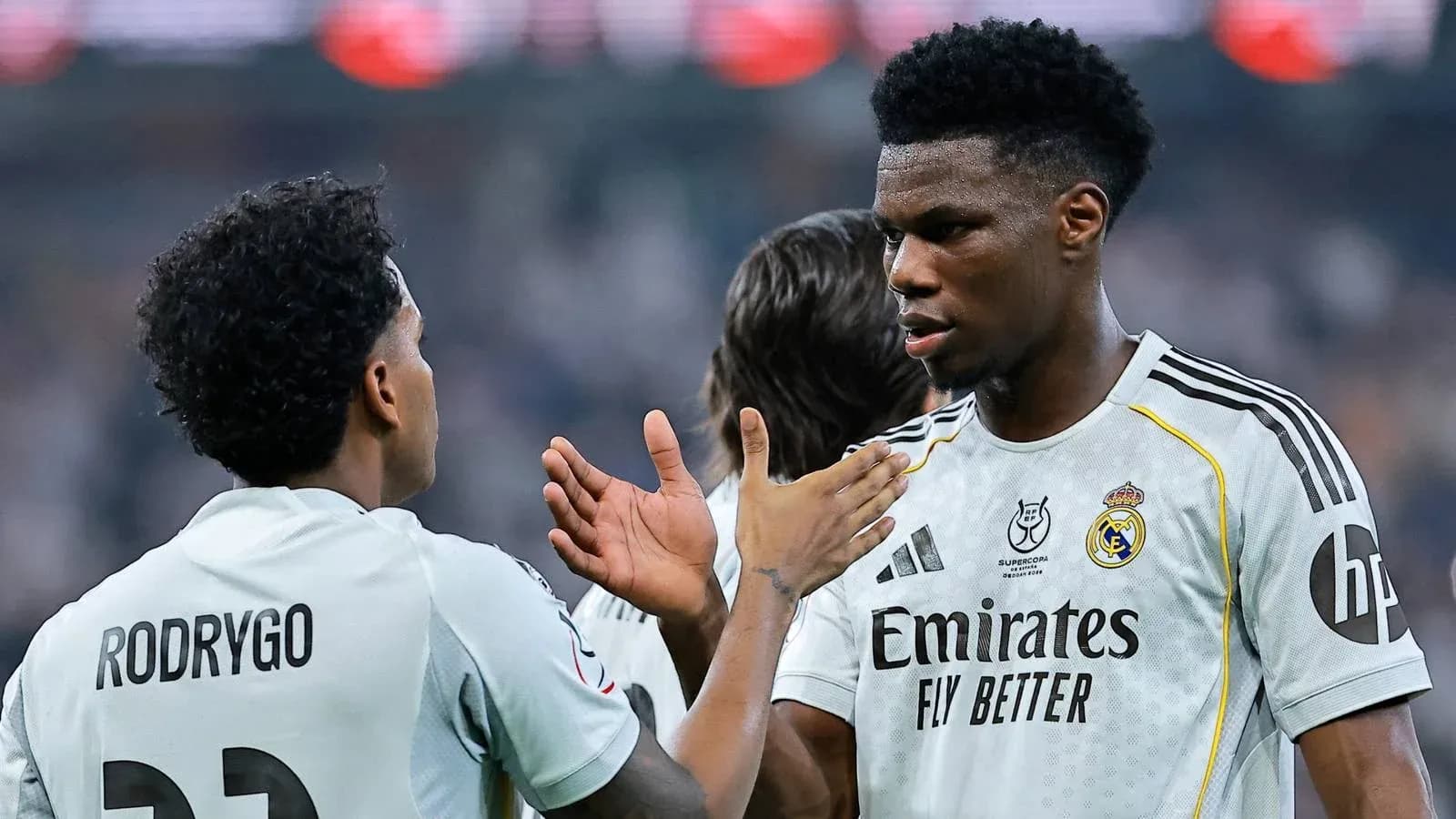 Rodrygo and Aurelien Tchouameni discussing on the field
