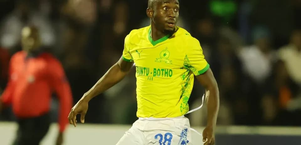 Player in yellow jersey during football match