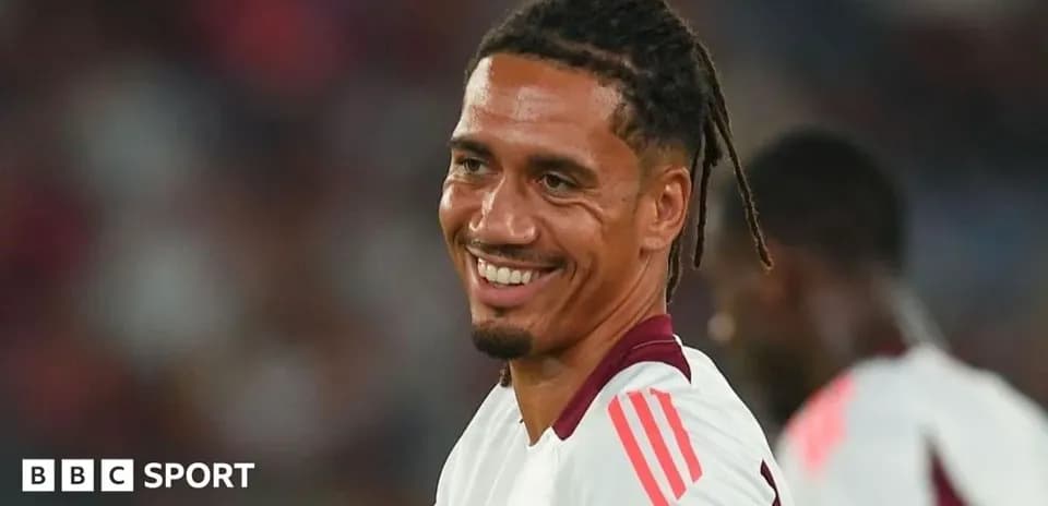 Player smiling during a football match