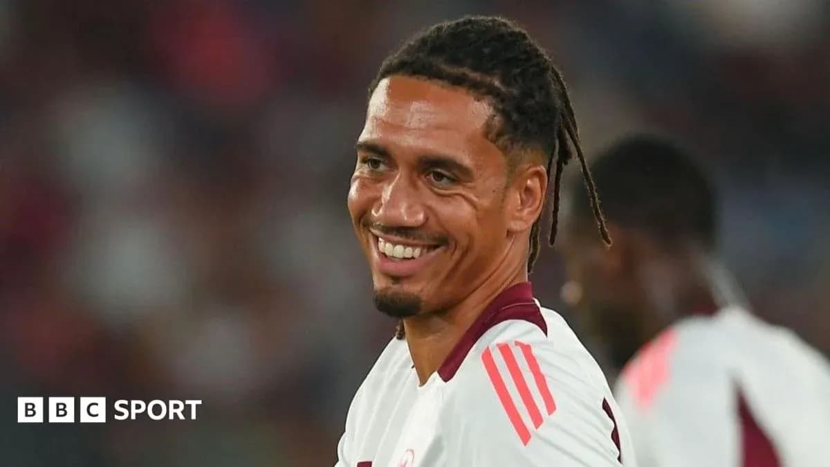 Player smiling during a football match