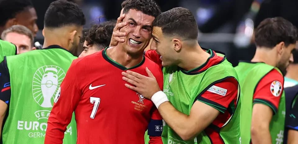 Cristiano Ronaldo with teammate after match