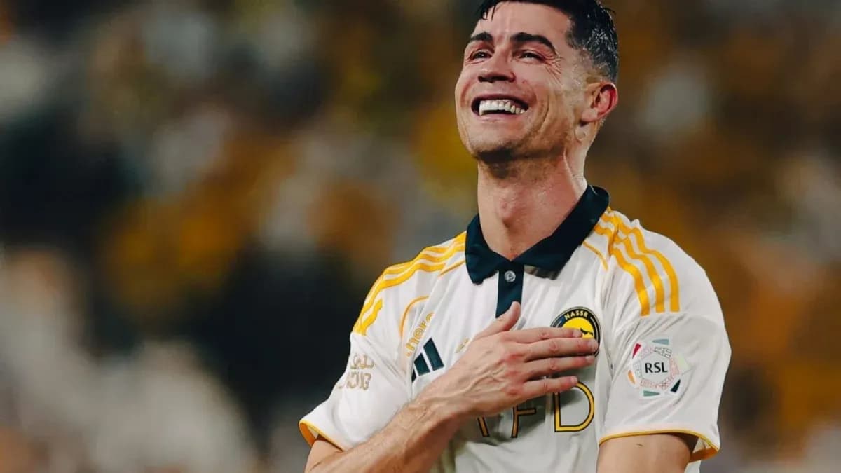 Player celebrating joyfully in team uniform