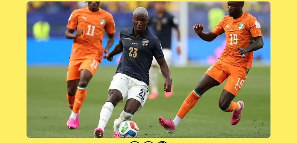 Ecuador player dribbling past two Ivorian defenders