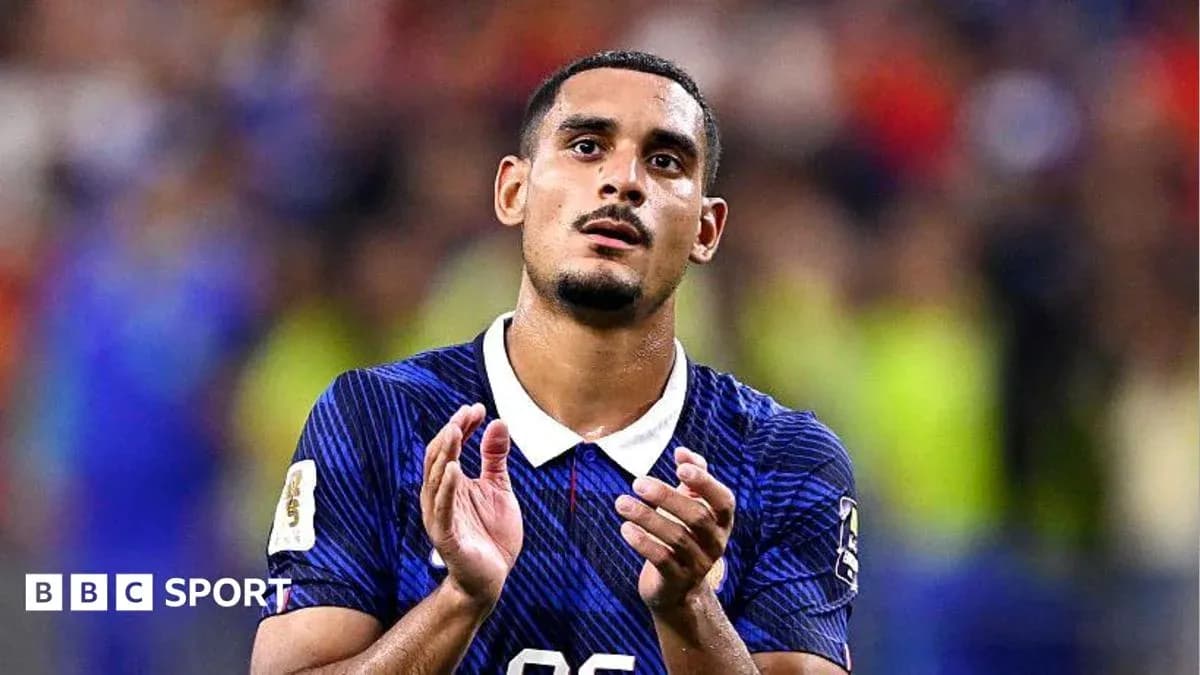 Player applauding fans after match on field