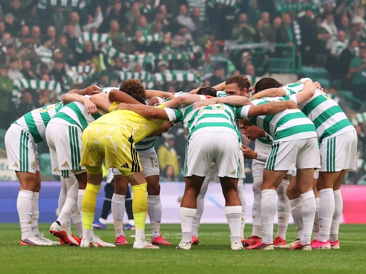 Celtic players in a huddle before the match