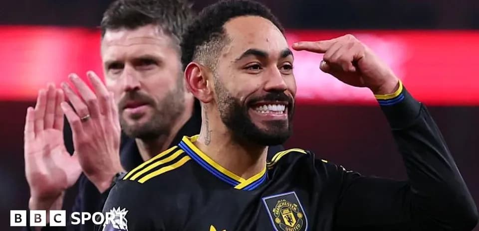 Player celebrating with hand gesture during match