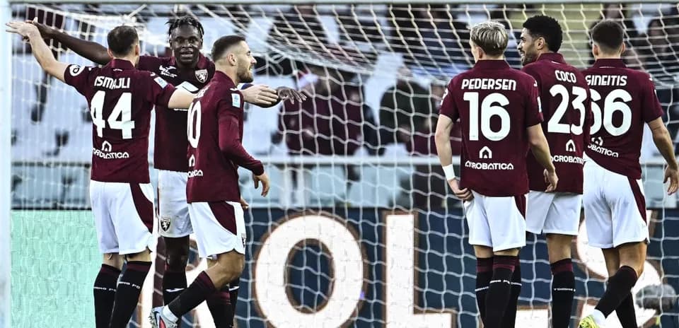 Torino players celebrating a goal during match