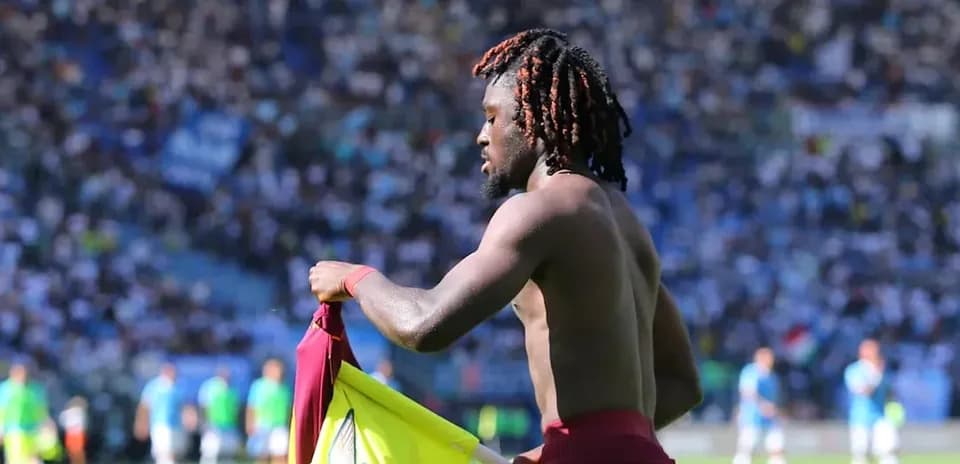 Player removing jersey during match at stadium