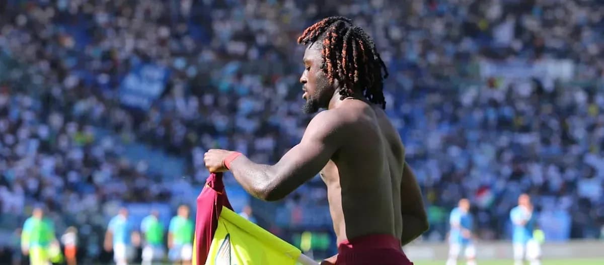 Player removing jersey during match at stadium