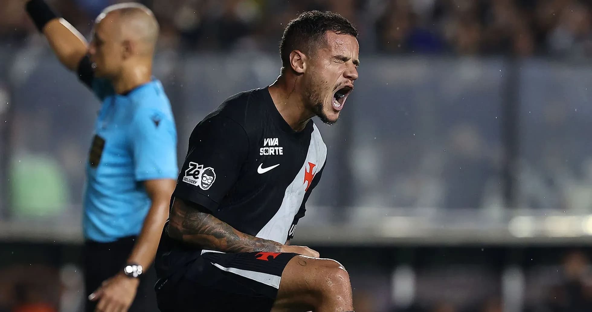 Player celebrating after scoring a goal during match