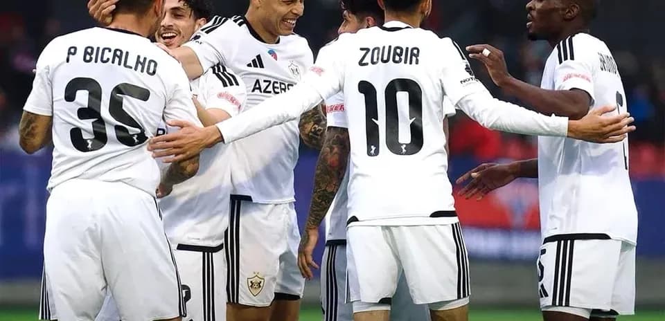 Qarabag players celebrating a goal together