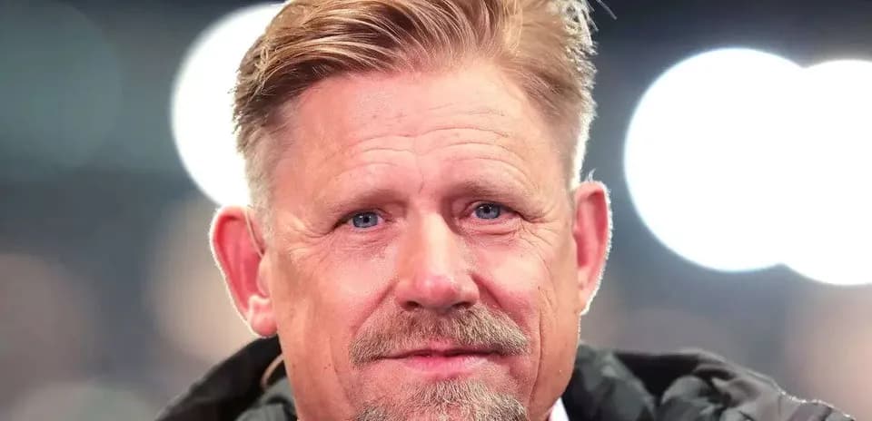 Close-up of a man with blond hair and beard