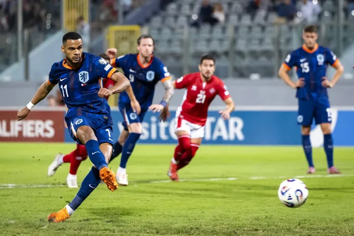 Player taking a penalty kick during match