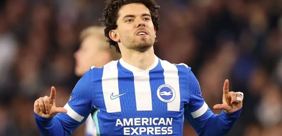 Player celebrating in Brighton & Hove Albion jersey
