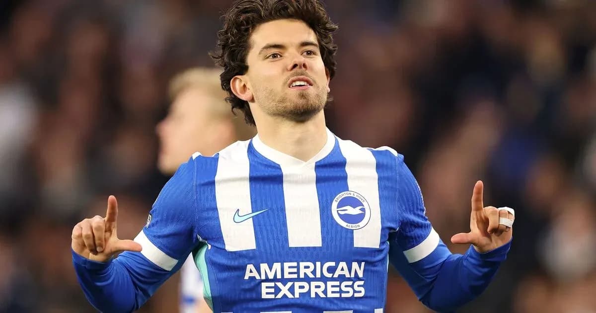 Player celebrating in Brighton & Hove Albion jersey