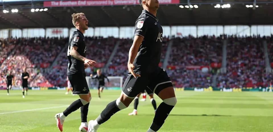 Player celebrating after scoring a goal during match