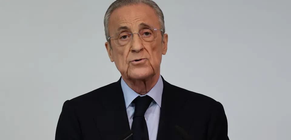 Man speaking at a podium during press conference