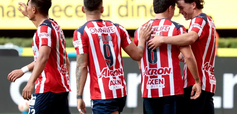 Chivas players celebrating a goal during match