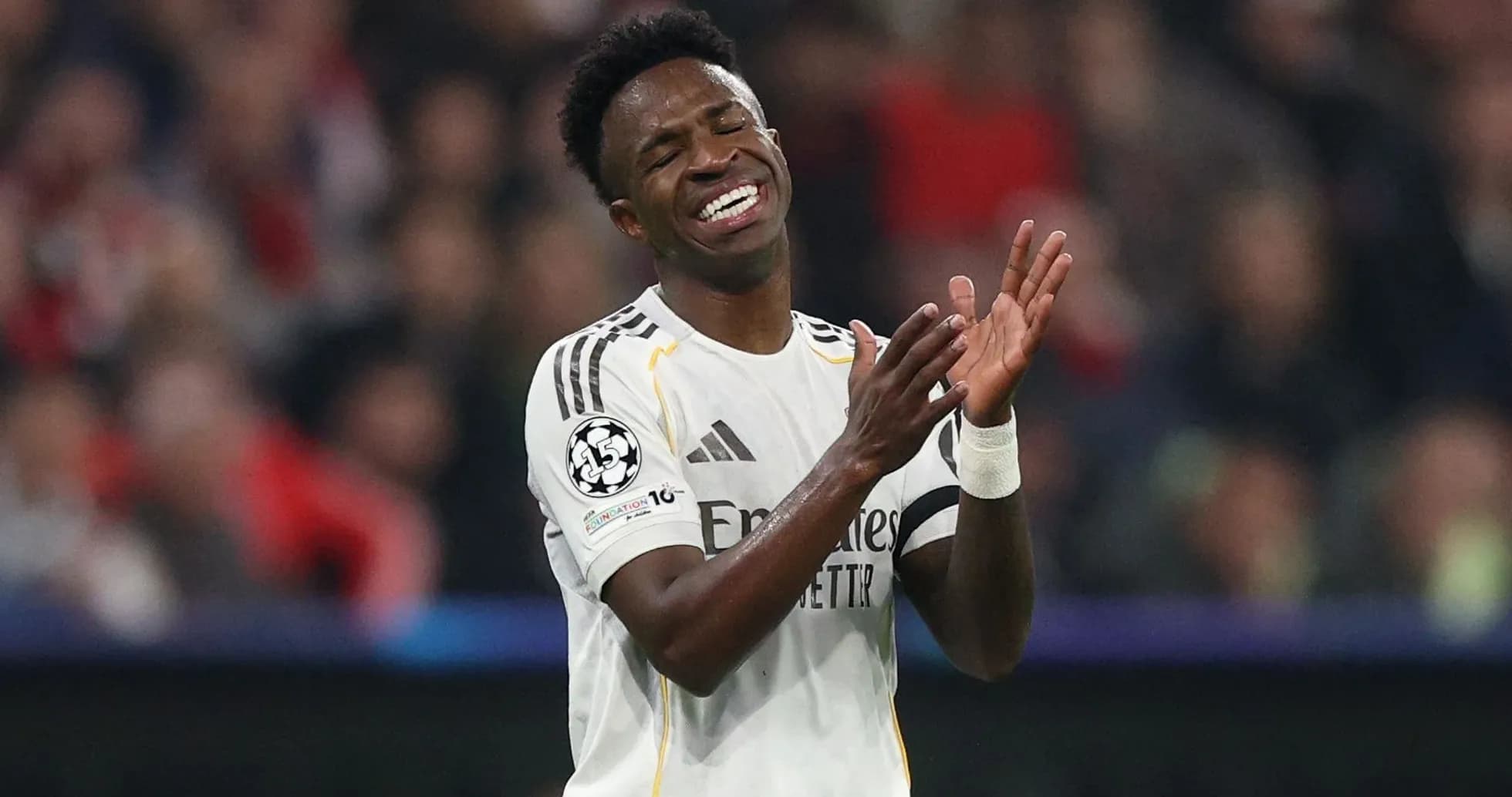 Player applauding during a UEFA Champions League match