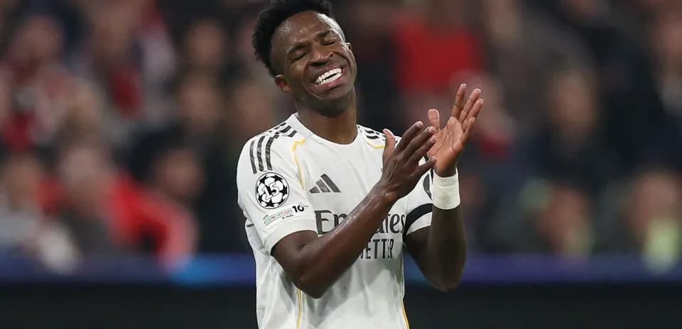 Player applauding during a UEFA Champions League match