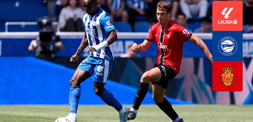 Deportivo Alaves player dribbling past Mallorca opponent