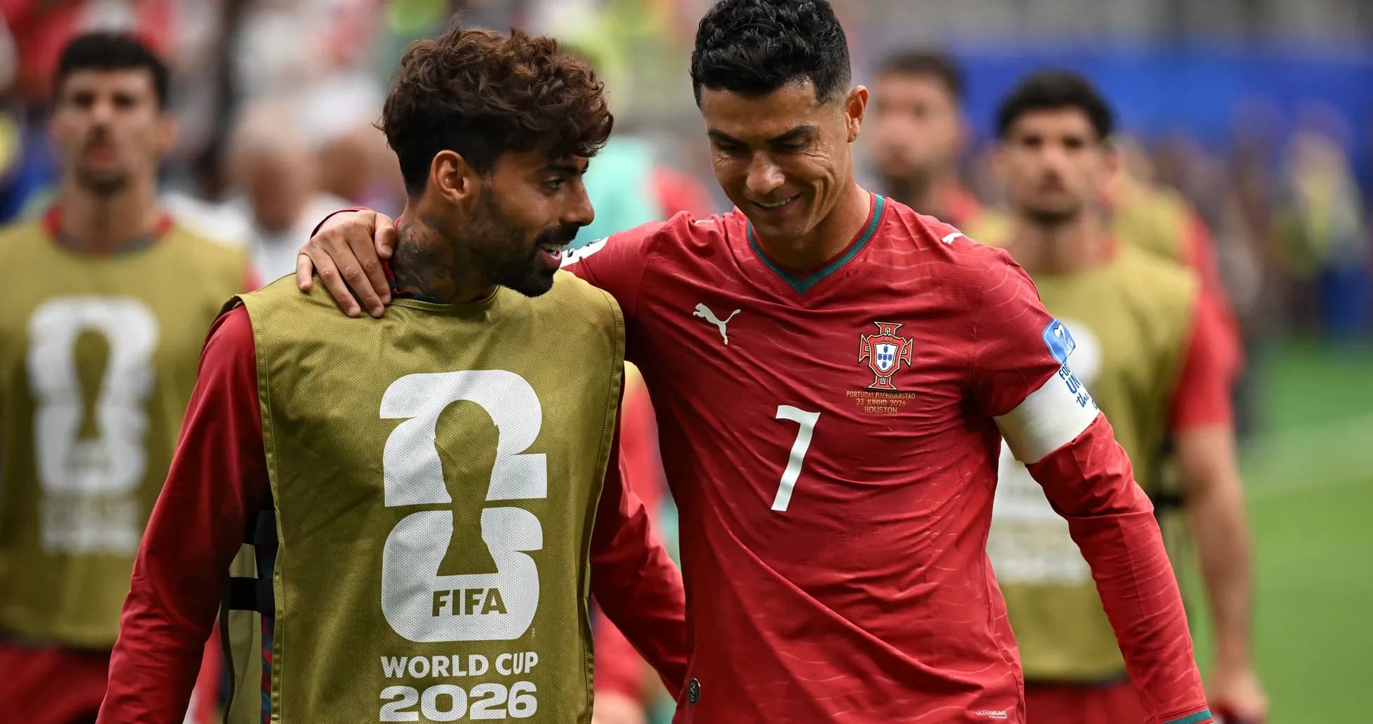 Cristiano Ronaldo and teammate walking on field