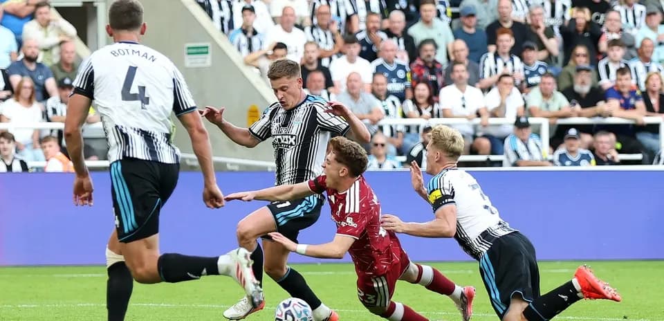 Players contesting the ball during a match action