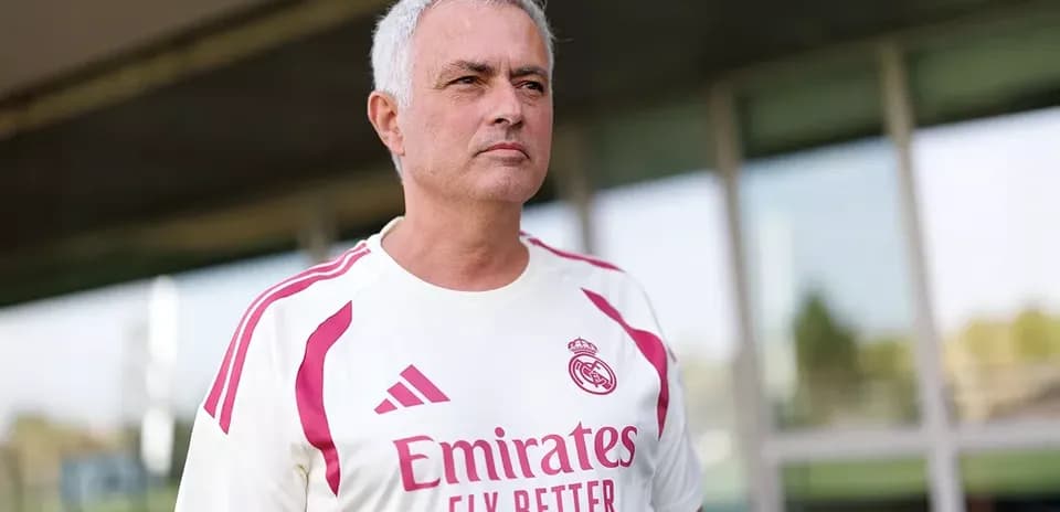 Coach in Real Madrid training kit outdoors