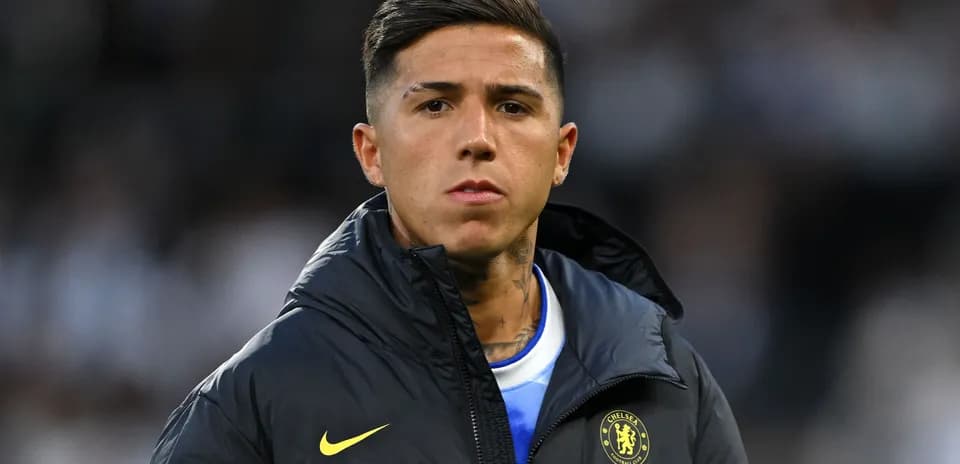 Player in Chelsea jacket before match