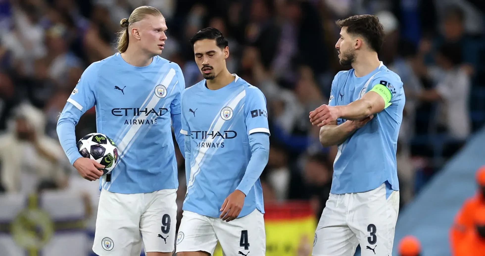 Manchester City players discussing during match