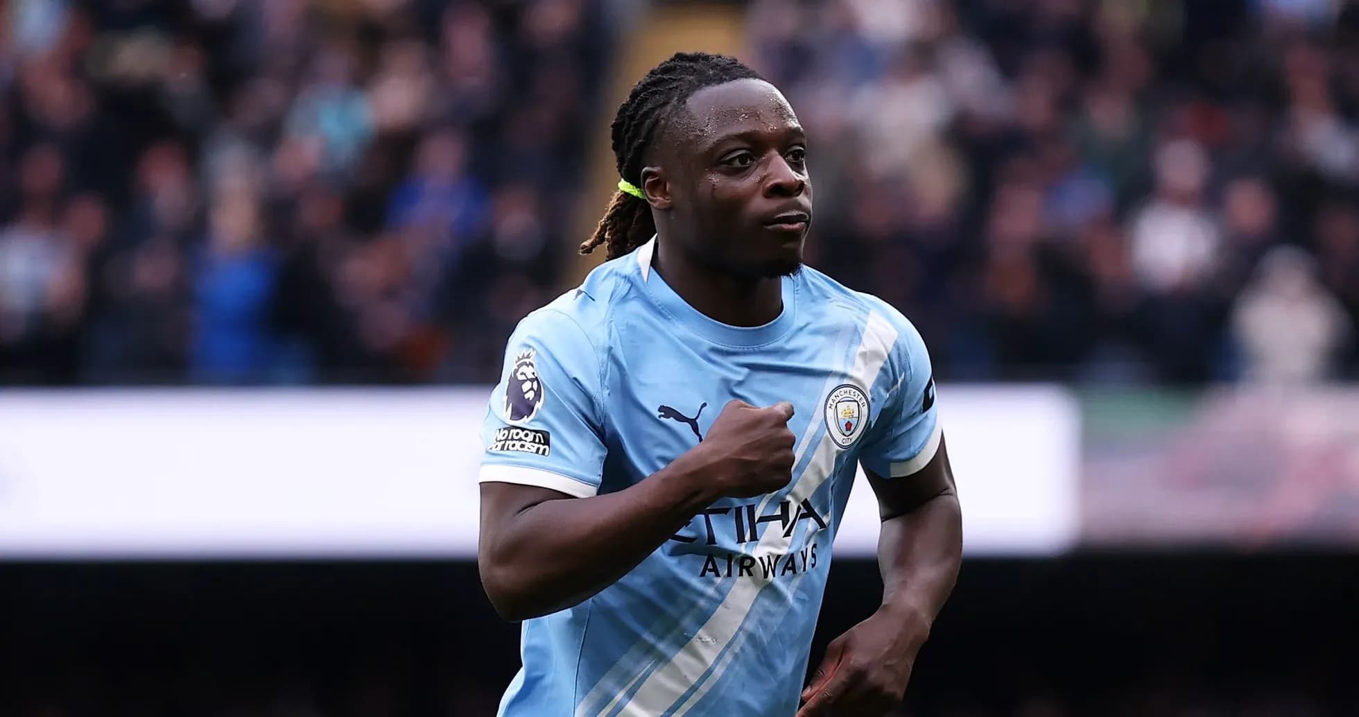 Manchester City player celebrating after scoring a goal