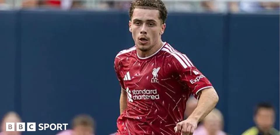 Liverpool player sprinting during a match