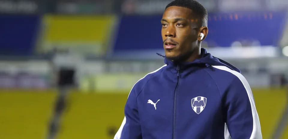 Player in warm-up gear on the field