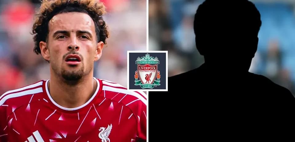 Liverpool player in red kit with club logo