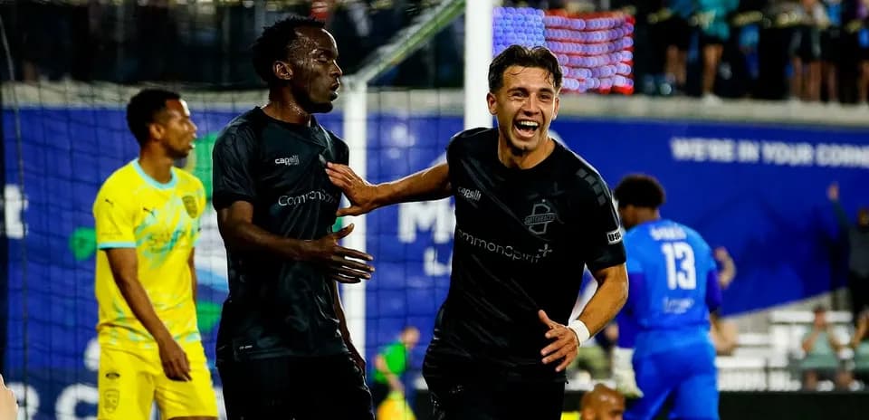 Players celebrating during FC Tulsa match