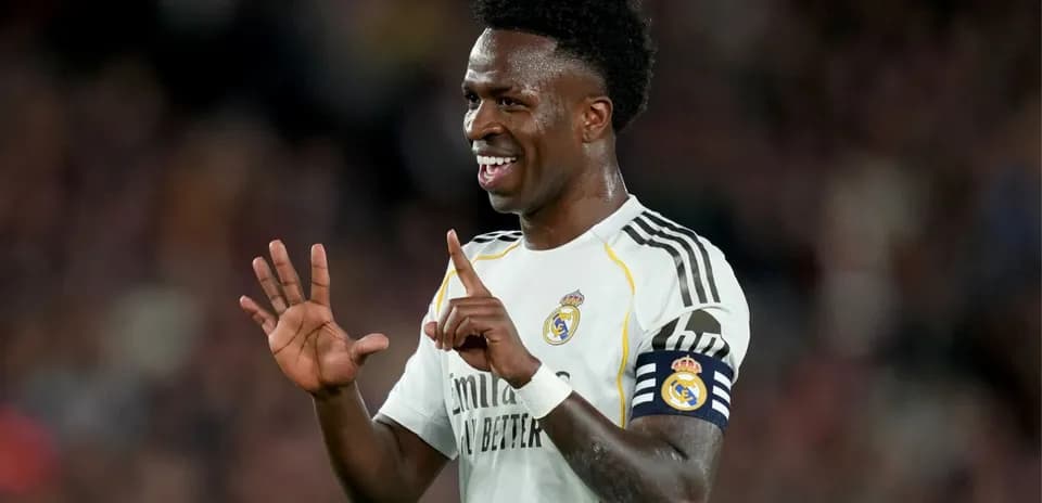 Player celebrating during match in Real Madrid kit