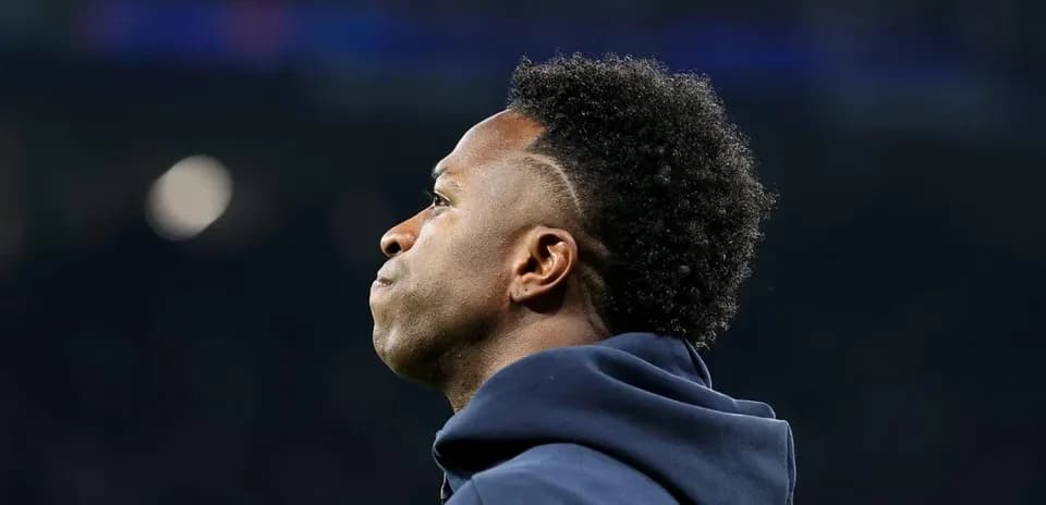 Player looking on from the sidelines during match