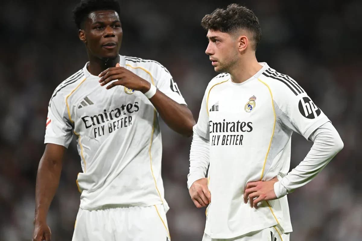 Two Real Madrid players discussing on the field
