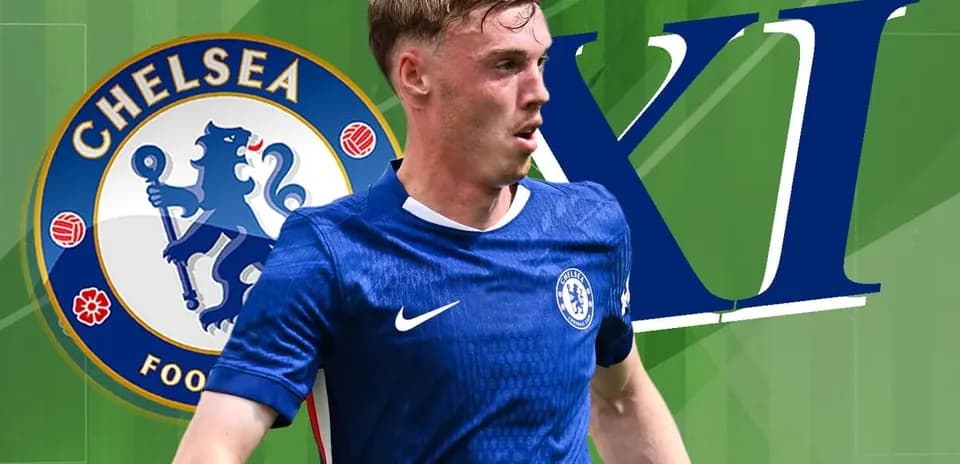 Chelsea player in blue kit with club logo