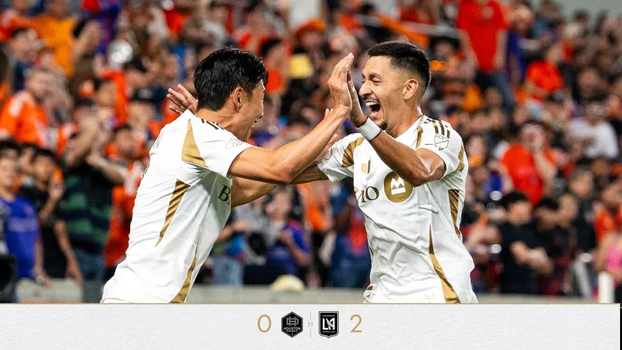 Players celebrating a goal during match